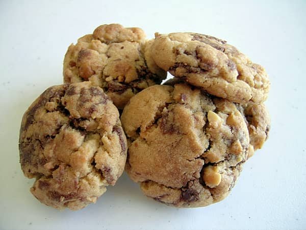 Butchi filled with Nutella, piled on a white surface.