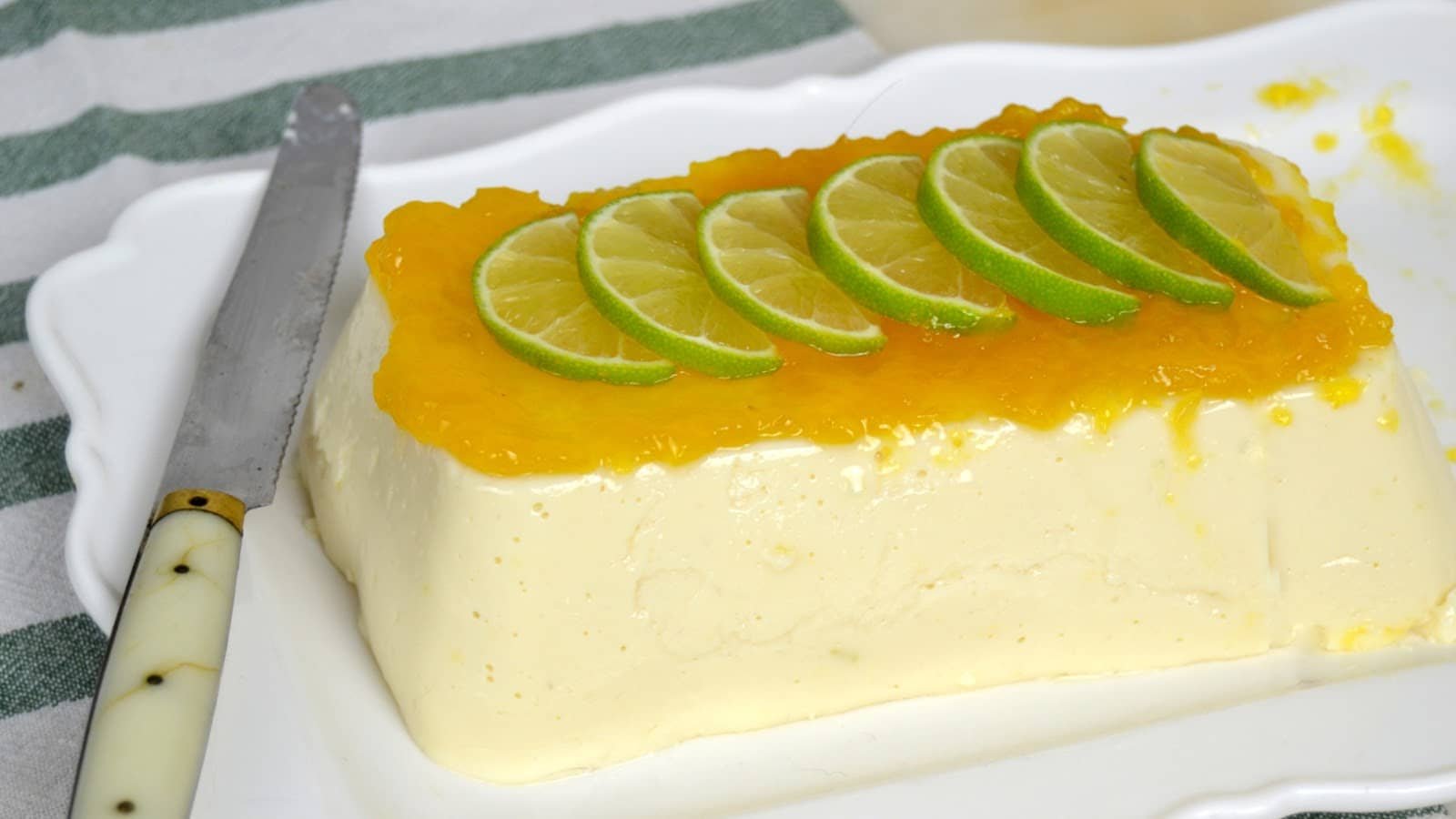 Delicious Leche Flan with Lemon Recipe, topped with lemon slices and a zesty citrus glaze, showcasing how to make Leche Flan with Lemon.