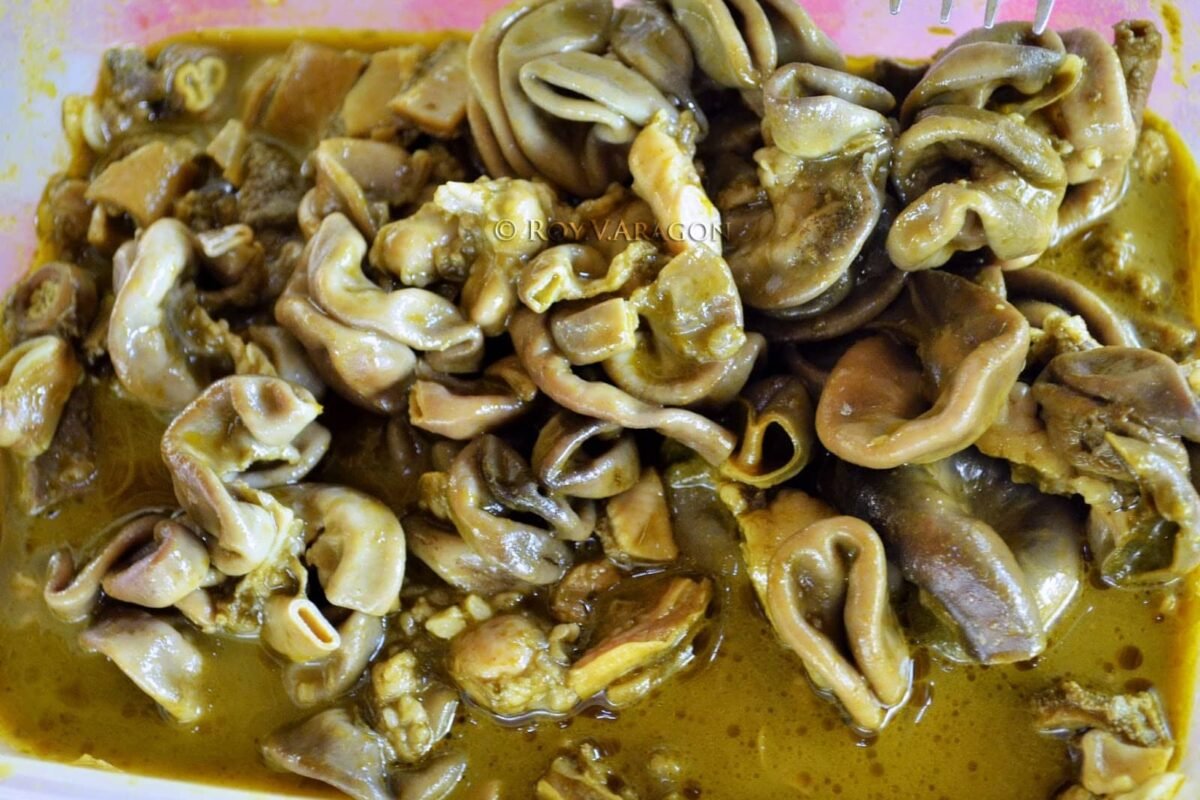 A dish of Filipino Papaitan made from beef innards in a savory broth.